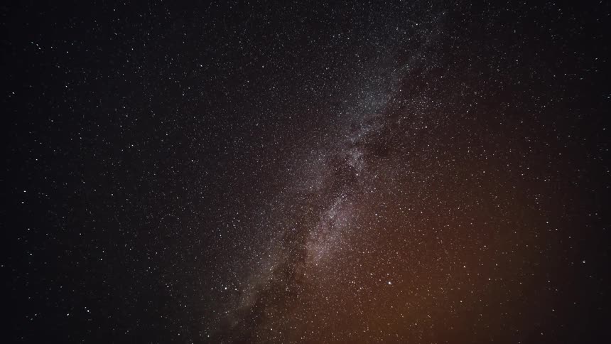 Stars glow in the night sky
