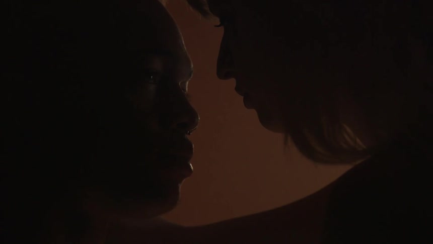 A man and woman console each other face to face