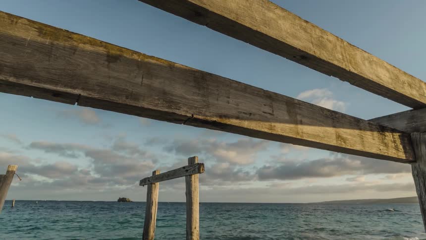 Sunlight on an old Jetty at Sunrise