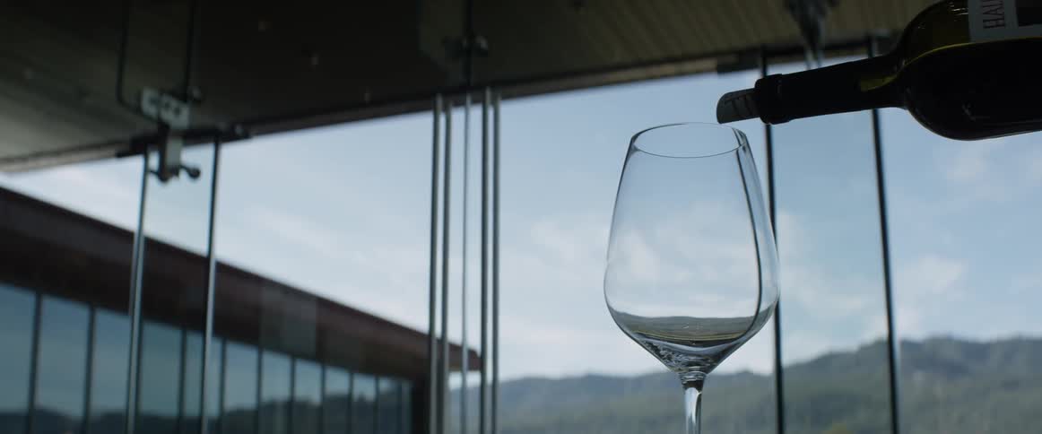 Wine is poured into a glass