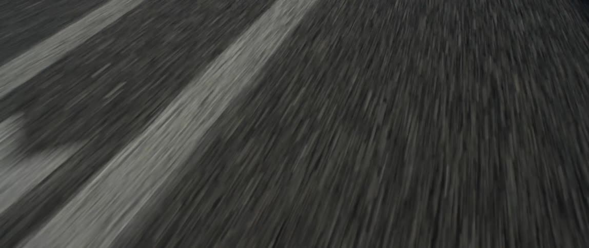 A road is passing by during the day