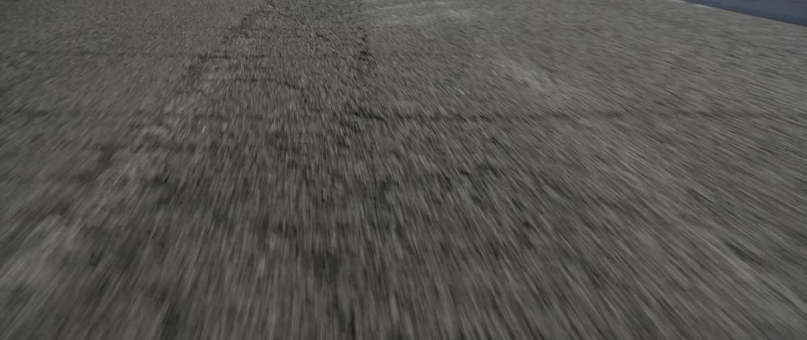 A road is passing by during the day