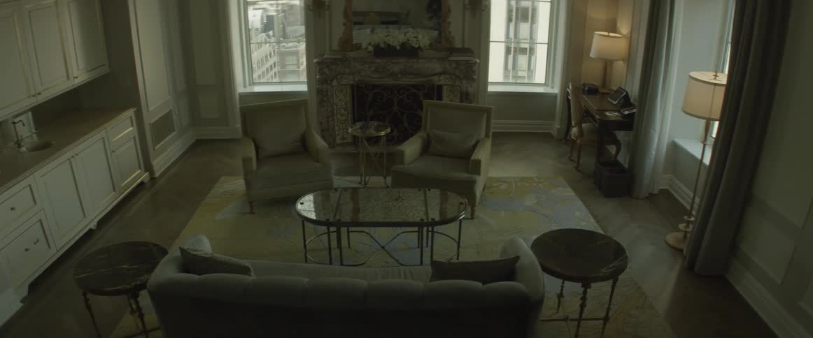 An empty house is filmed from the stairs