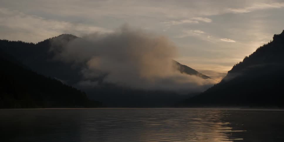 Rippling lake sits next to mountains