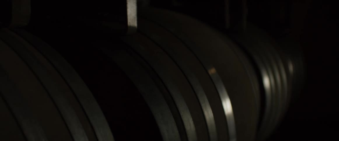 Barrels with silver trim sit next to each other