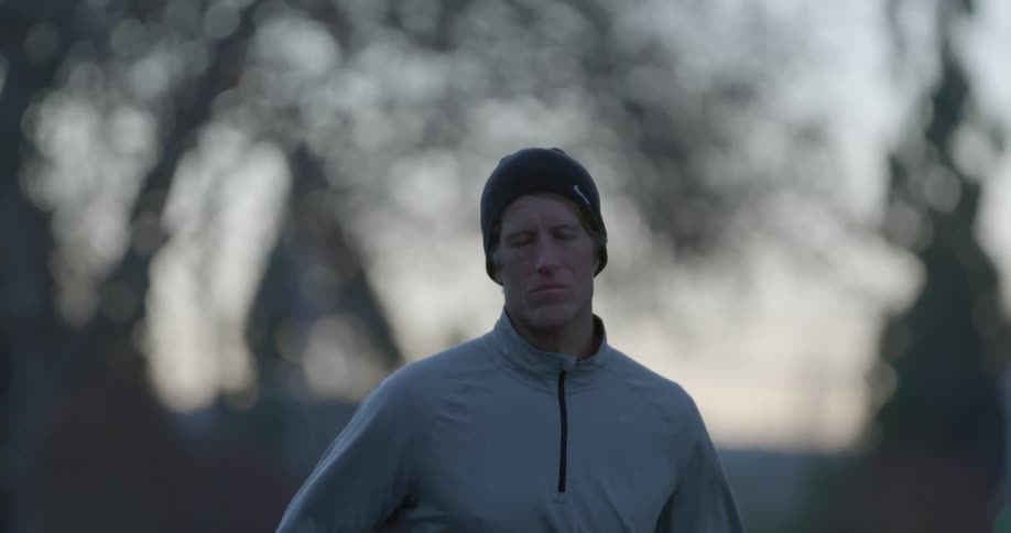 Man jogging through the woods