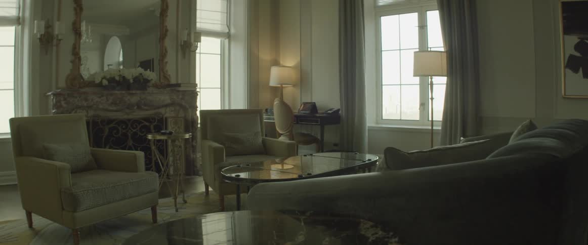 Sunlight shines through the windows in a decorative room