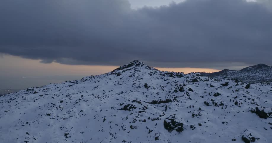 Snowy mountains on a cloudy day