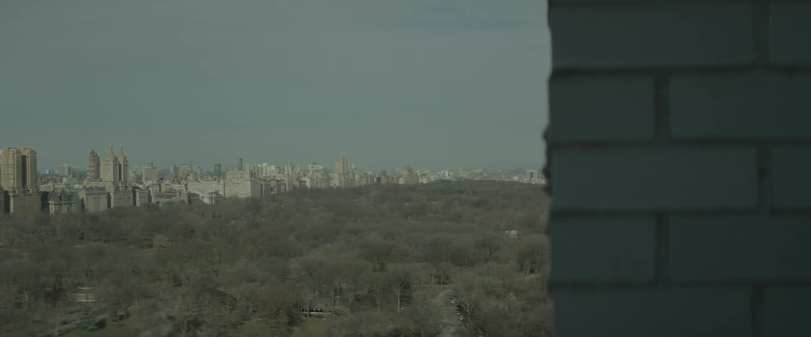 The city is being filmed from a balcony