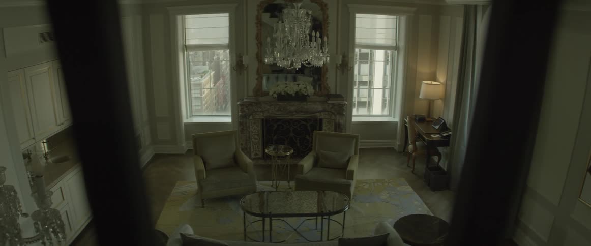 A living room sits empty during the day