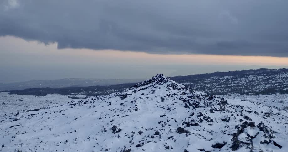 A snow covered mountain top