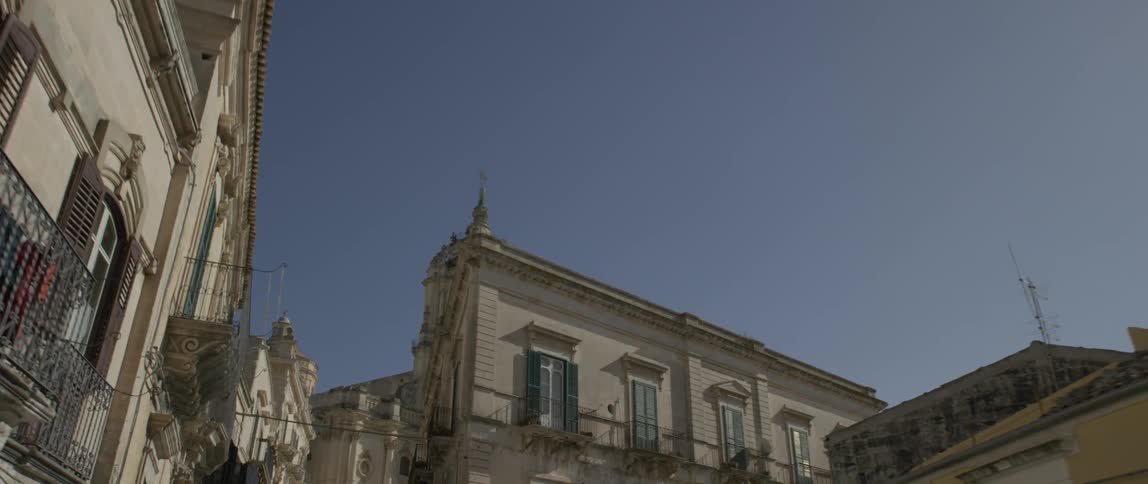 Tightly packed buildings made of white stone