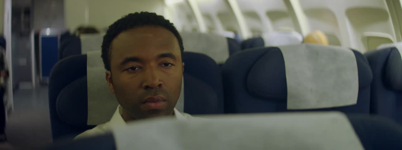 A man looks around an airplane