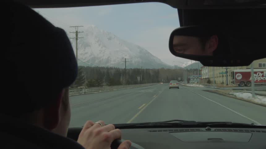 A person driving a car