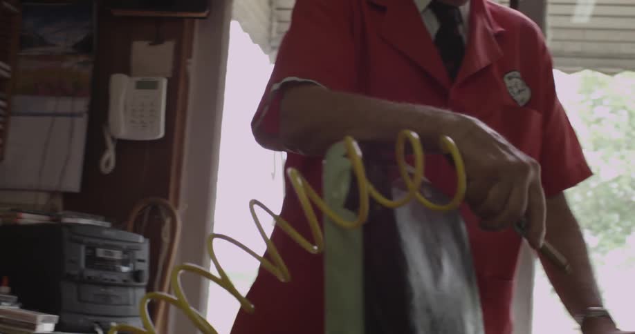 A person handling an air blower