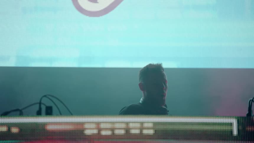 A dj is playing a concert