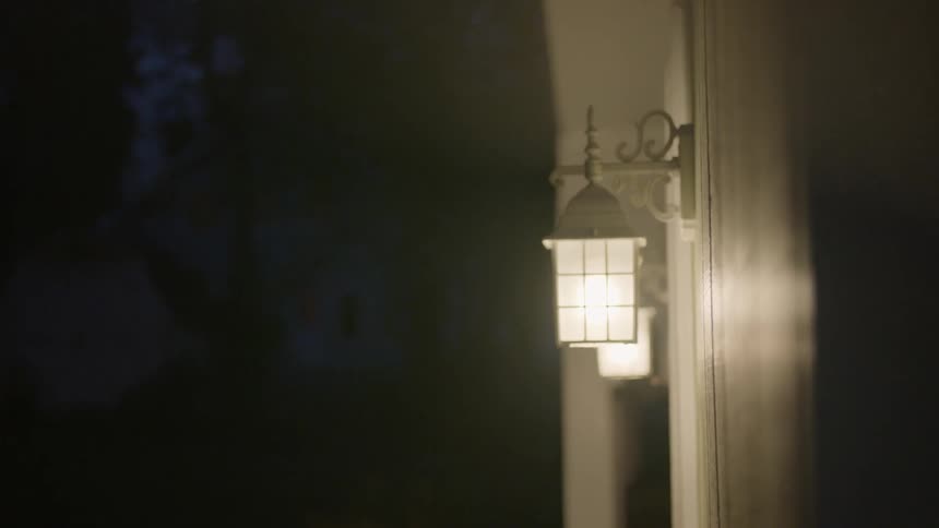 Outdoor lantern lights shine at night