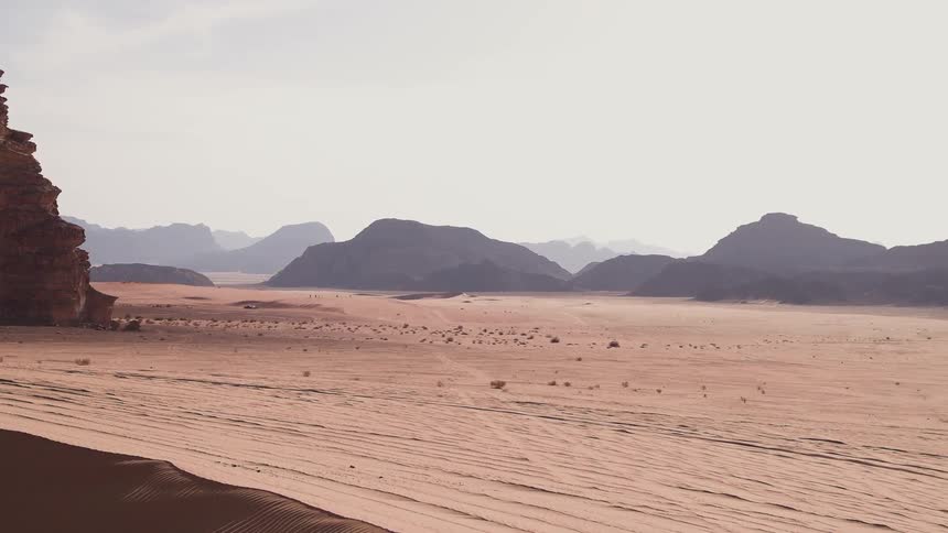 A desert broken up by mountains