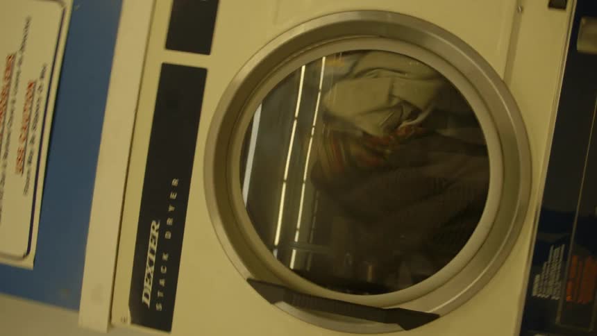 Clothes tumble dry in a dryer