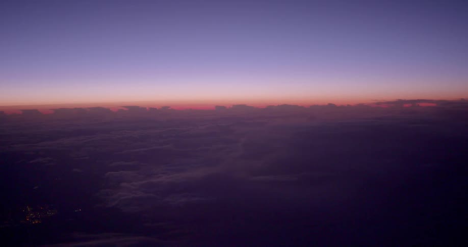 A beautiful sunset aerial view of the cloud covered sky
