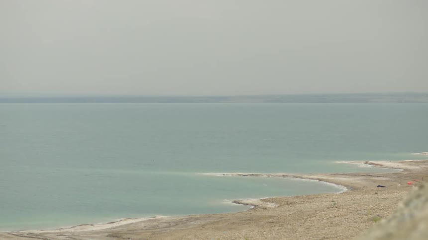 A sandy coastline on an overcast day