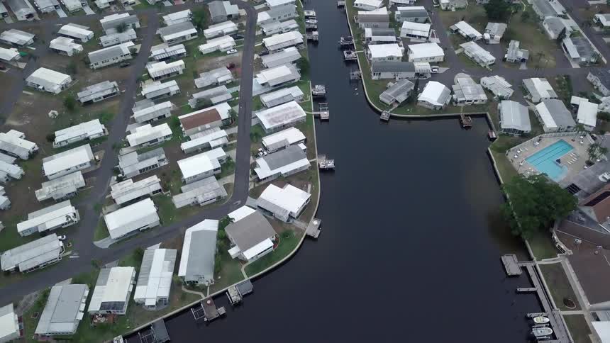 A river surrounded by a neighborhood