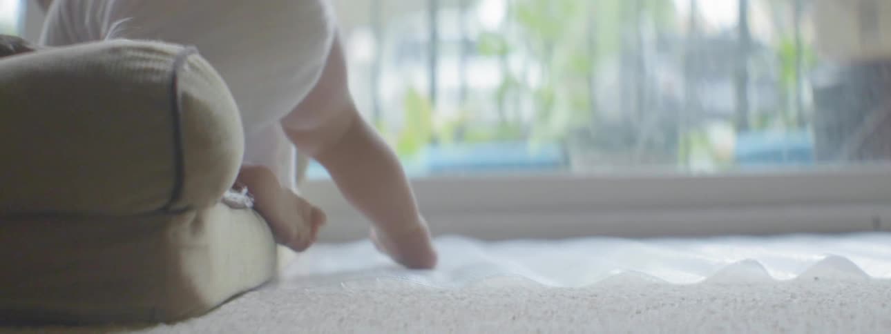 A baby takes a few steps then falls