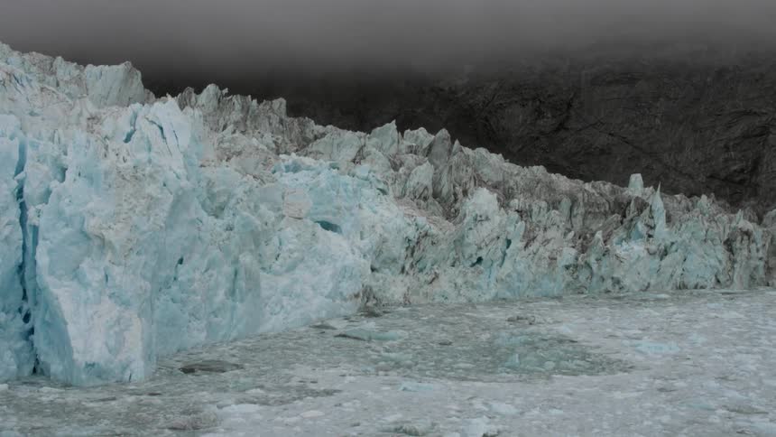 Icy glaciers are shown in the wilderness