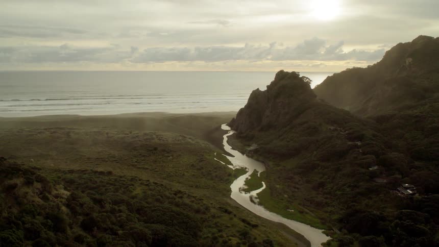 Stream leading into a large body of water