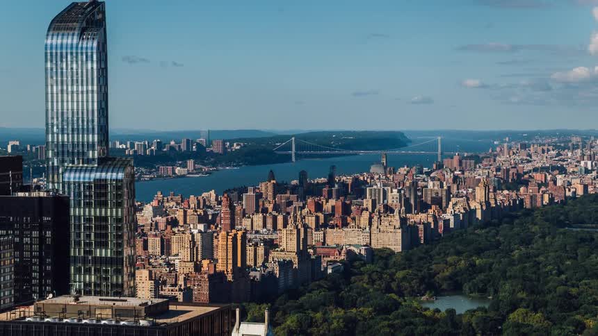 Time lapse of shadows over buildings in a city