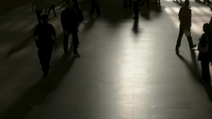 An office patrols the ground at a transportation terminal