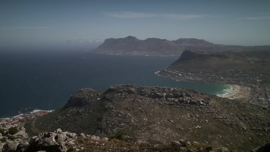 A rocky ridge overlooks the marina and beaches below