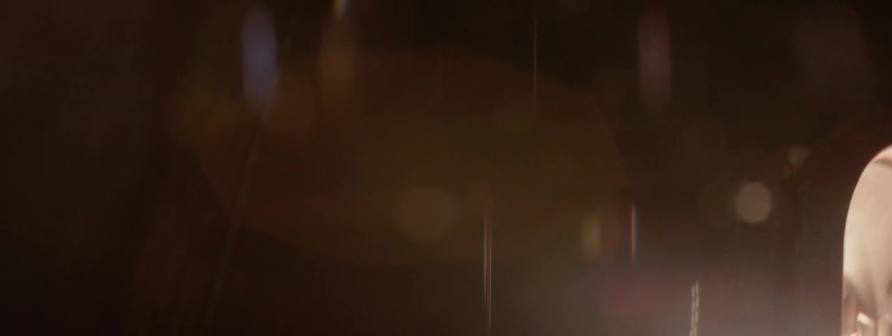 Lights flash and move in a dark area