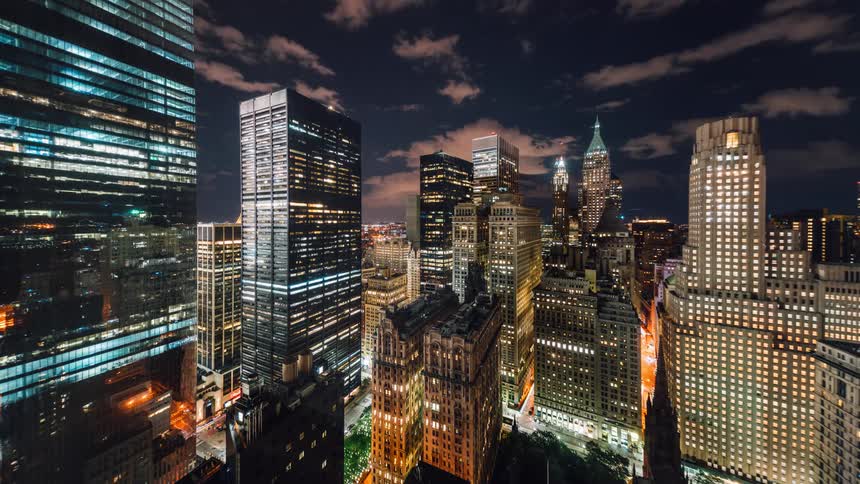 The city is brightly lit at night