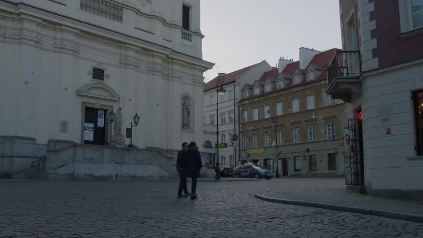 People walk down the city street together