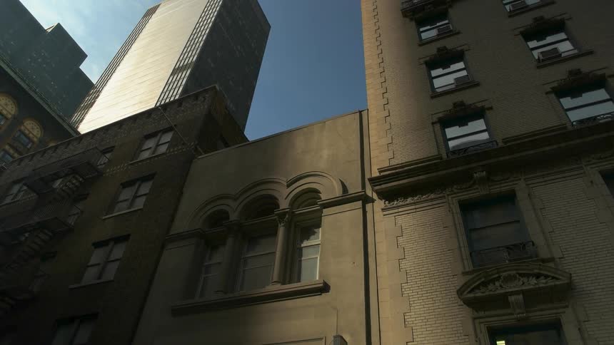 Tall buildings in a city on a sunny day