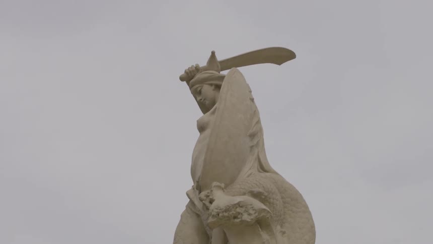 A statue of a woman warrior is displayed