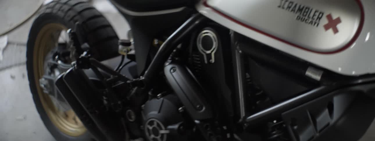 A motorcycle is parked in a garage