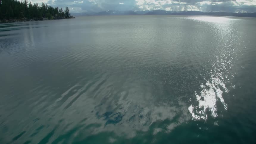 Water ripples on a mountain lake