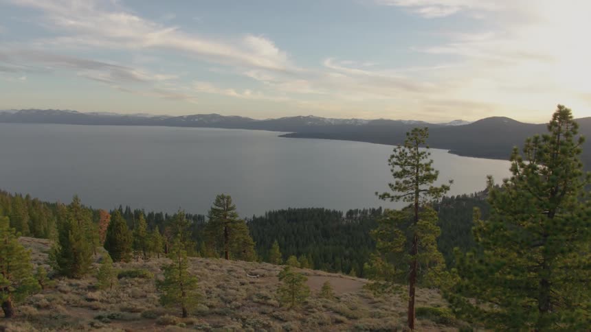 The hillside leads to the lake below