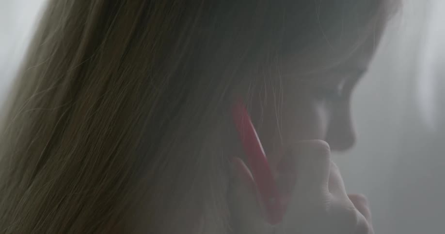 A girl puts on a toy stethoscope