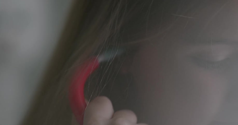 Woman putting stethoscope in her ears