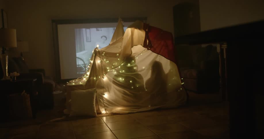 People have set up a tent in the living room