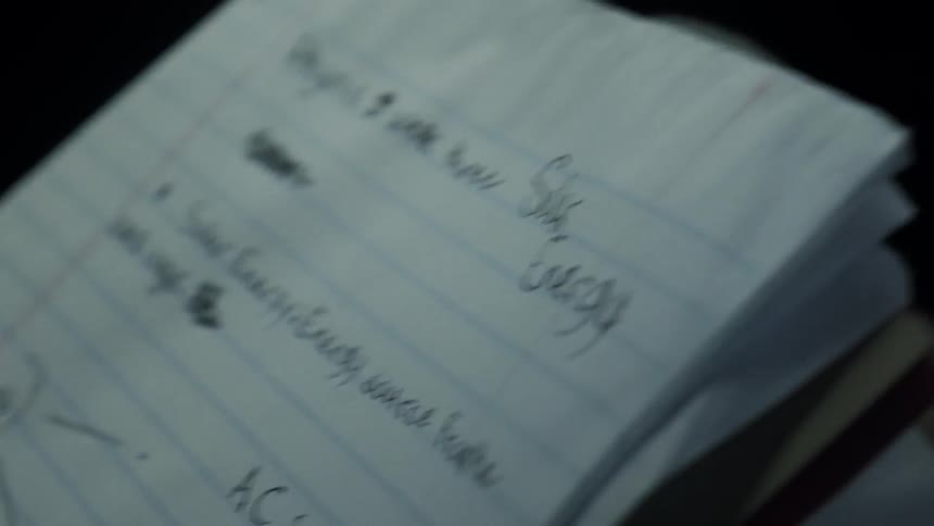 A notebook is full of writing