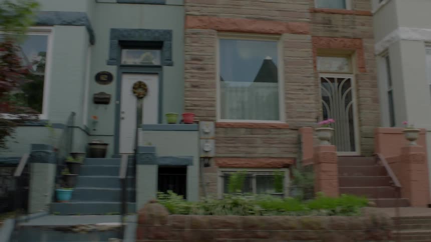 The street has many brick houses