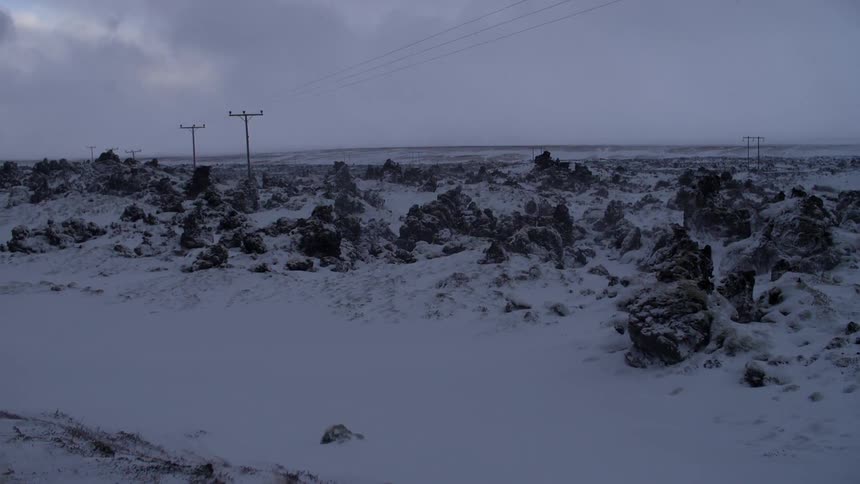 Snow covers the rocky landscape