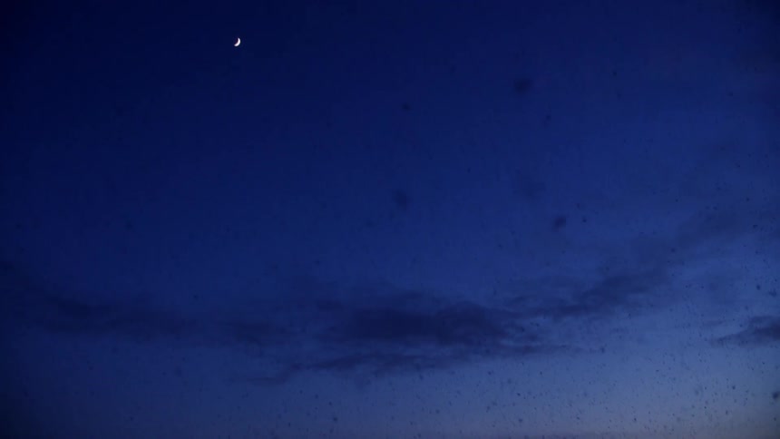 Ashes floating in the air at sunset