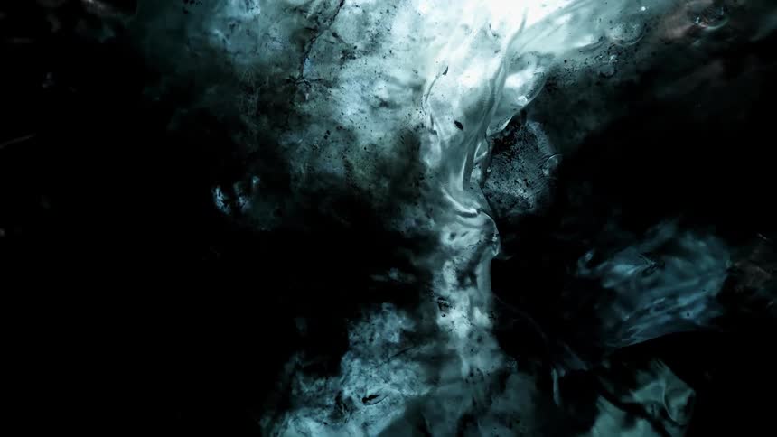 The cave is dark and made of ice and rock