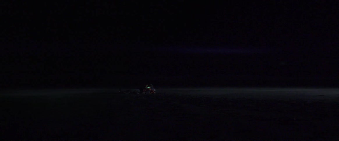 A vehicle is moving in the night distance