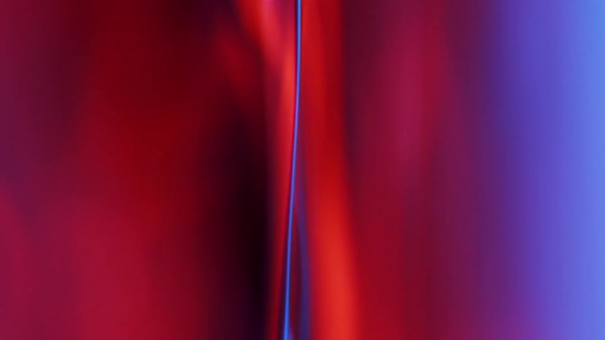 Red curtains open and close as they move around
